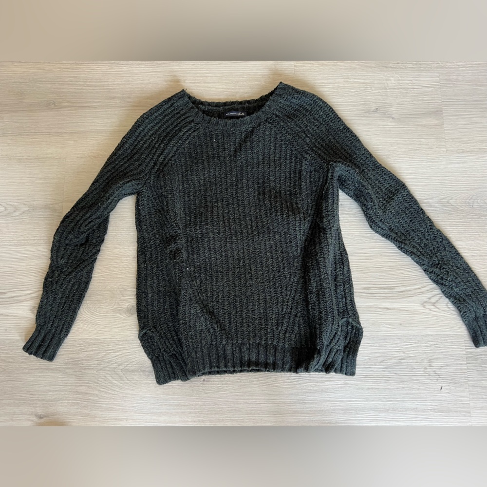 Dark green sweater